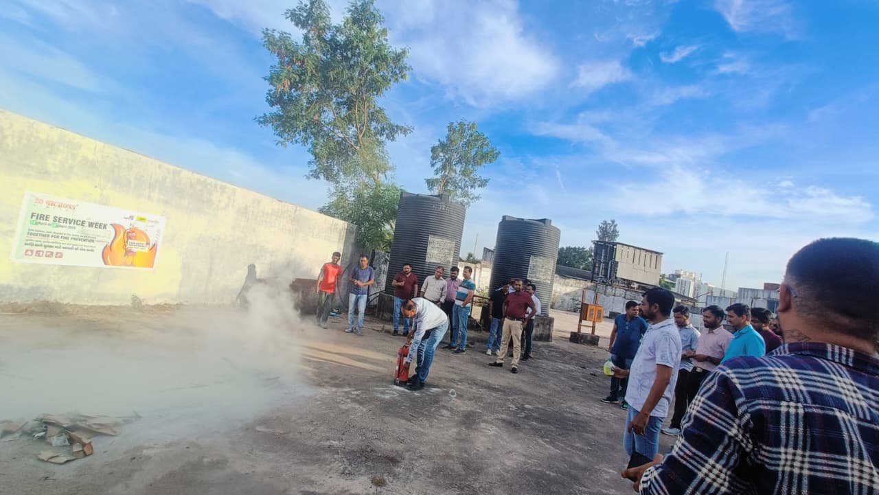 Workers participating in fire safety training